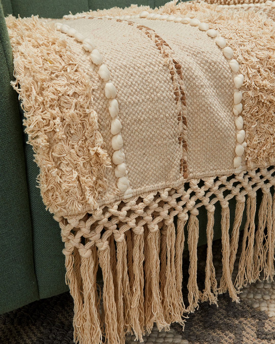 Hand crafted Beige 3 seater sofa cover with tassles