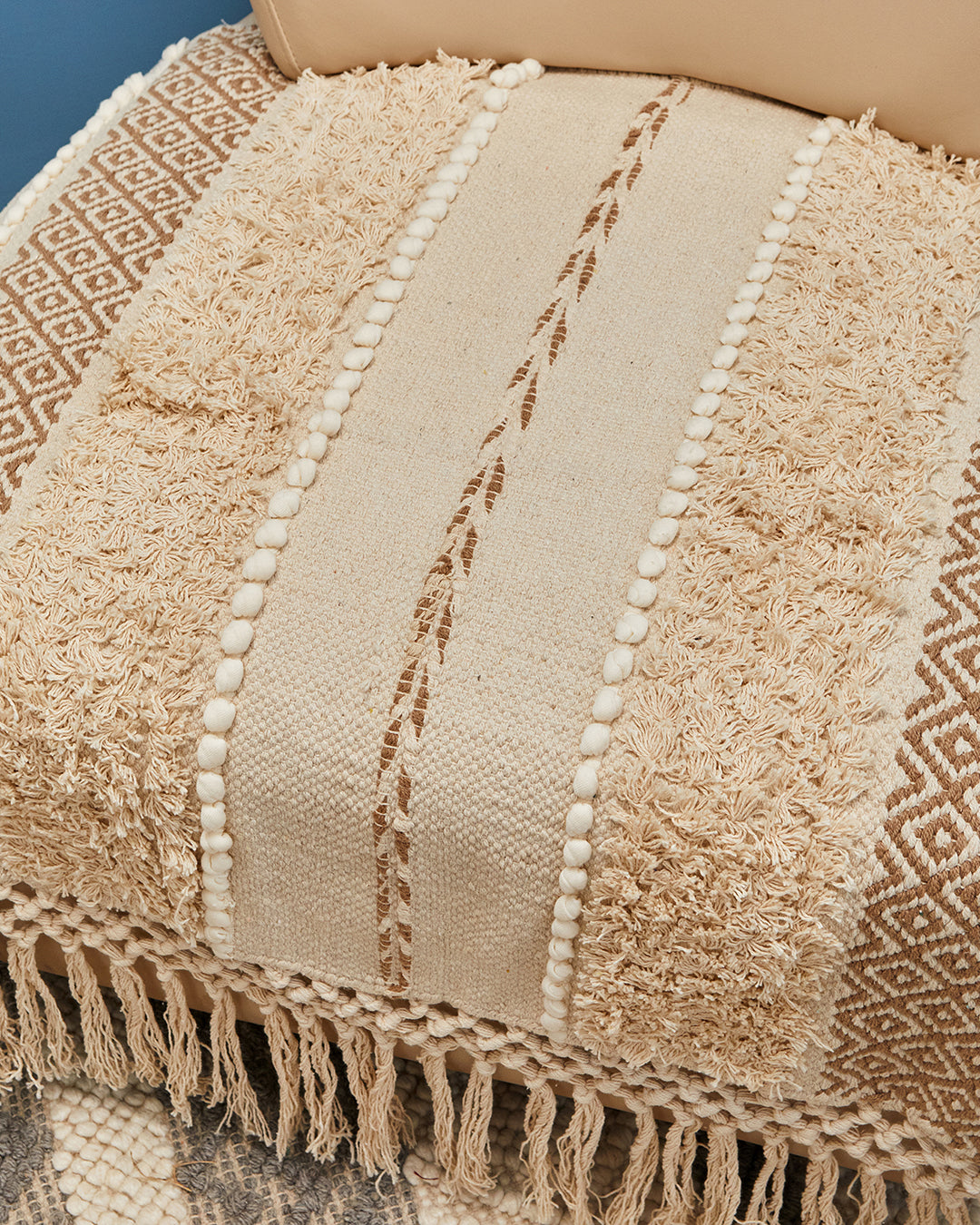 Hand crafted Beige 1 seater sofa cover with tassles