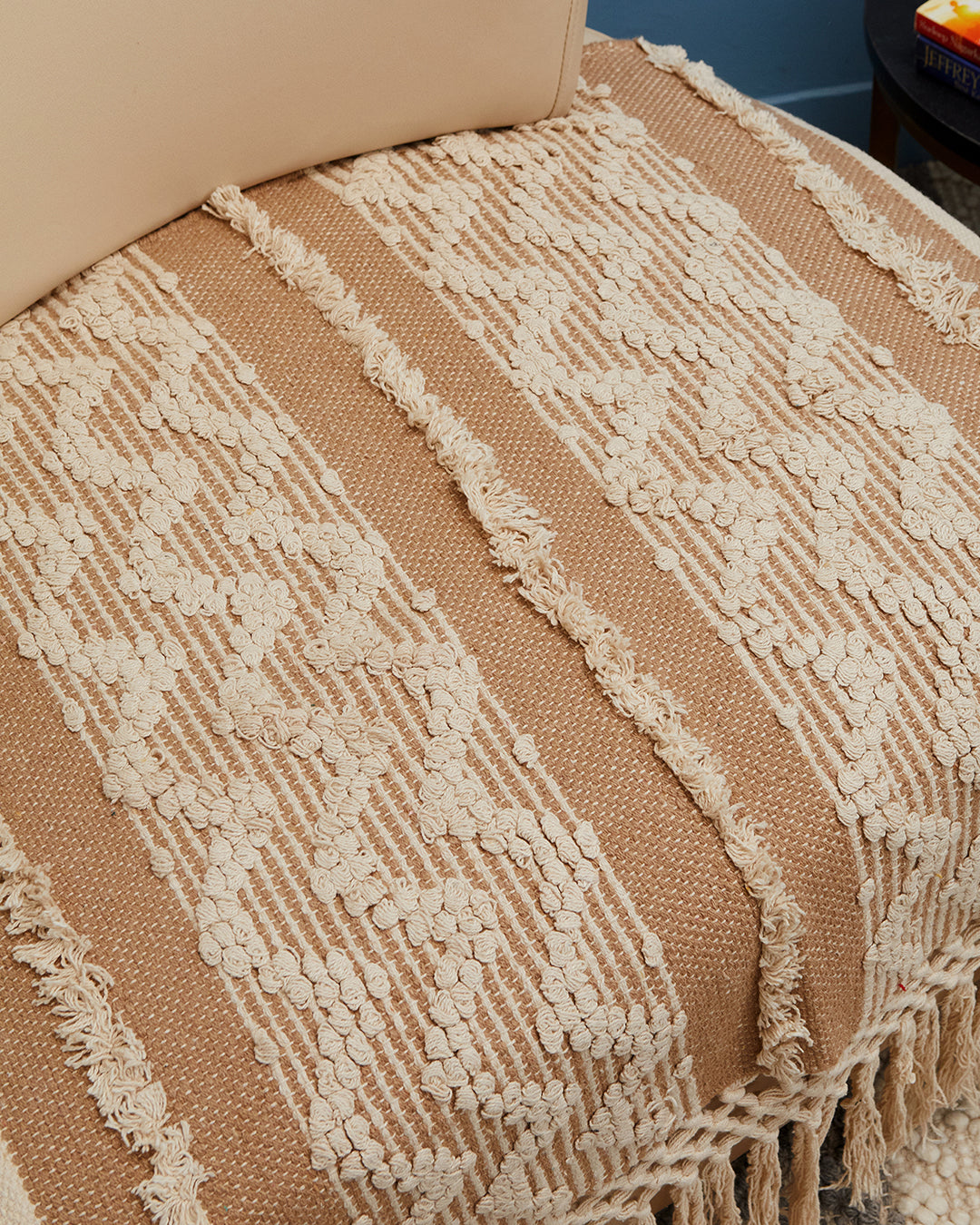 Tassled brown woven 1 seater sofa cover with tassles