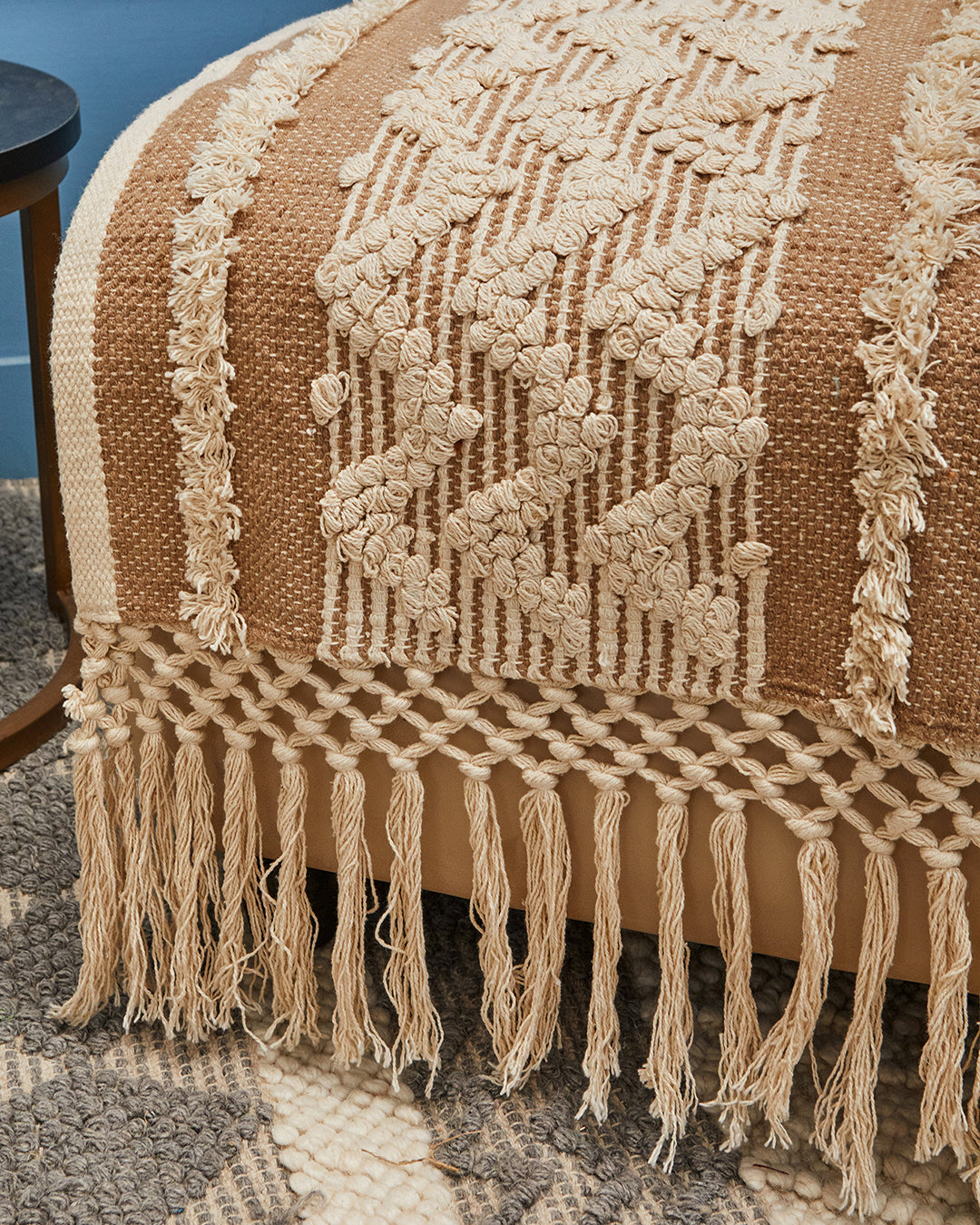 Tassled brown woven 1 seater sofa cover with tassles