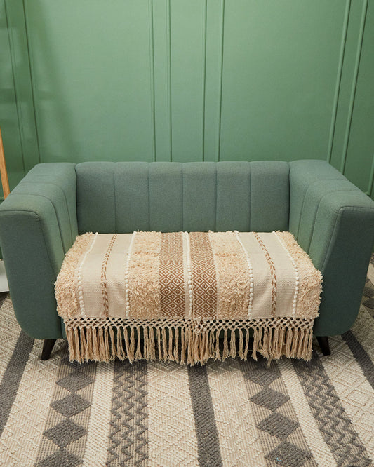 Hand crafted Beige 2 seater sofa cover with tassles