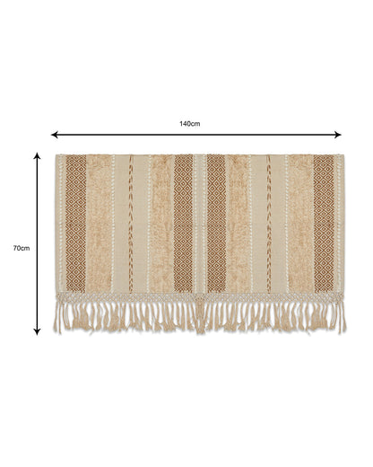 Hand crafted Beige 2 seater sofa cover with tassles