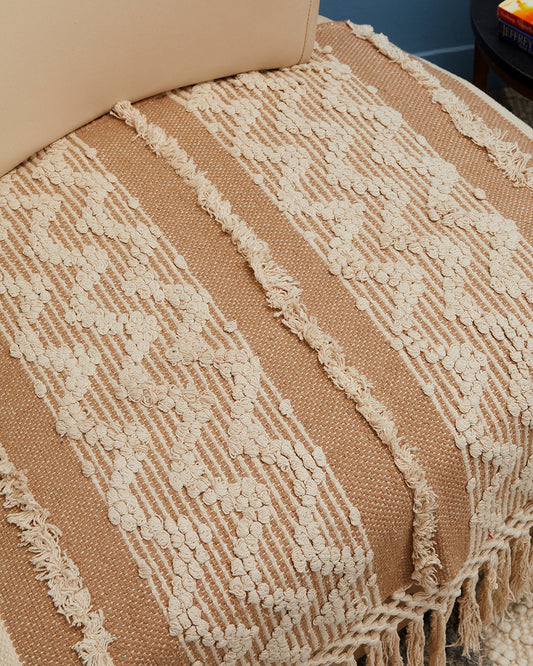 Tassled brown woven 1 seater sofa cover with tassles
